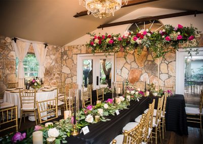 The dining room at The Vista On Seward Hill boasts beautiful chandeliers