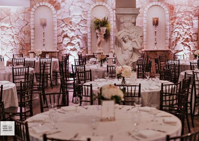 The dining room at The Vista On Seward Hill boasts beautiful chandeliers