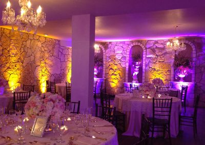 The dining room at The Vista On Seward Hill boasts beautiful chandeliers