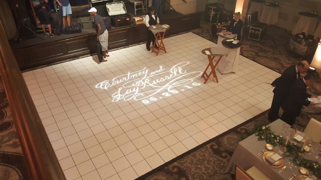 Custom Gobo Light Projection on White Dancefloor