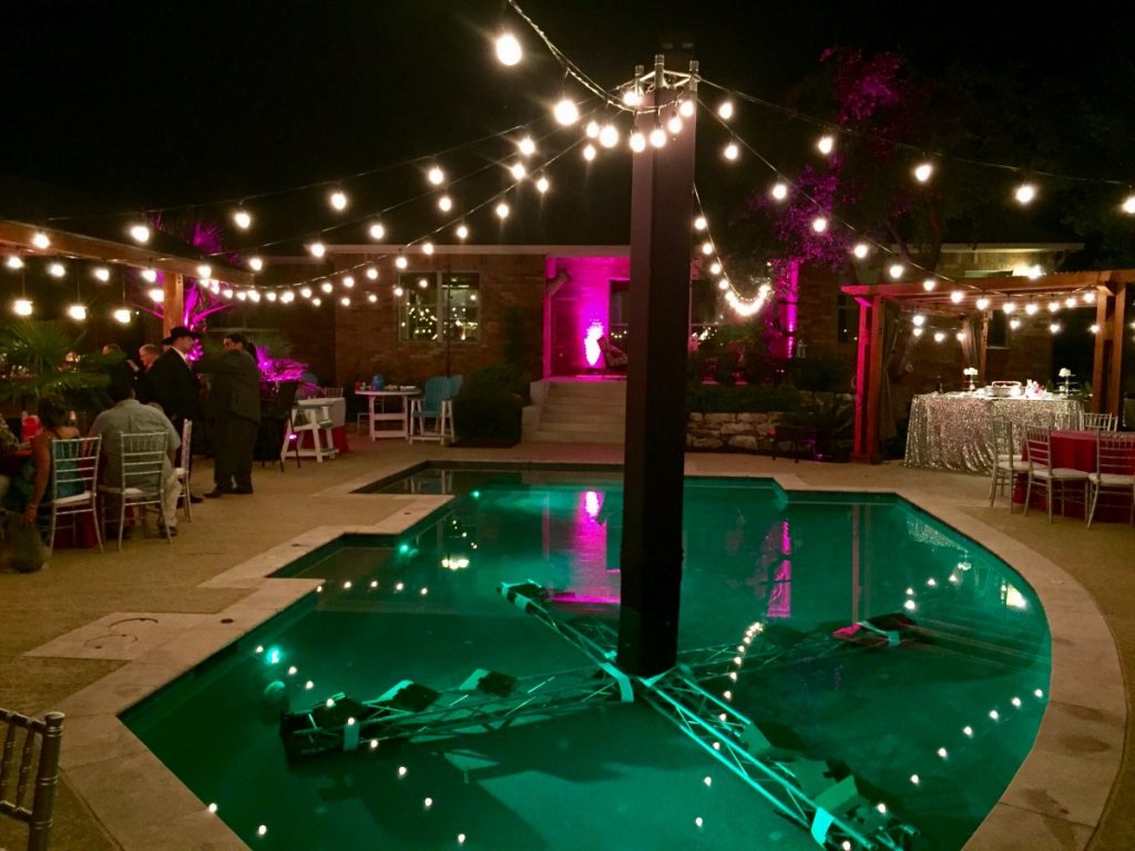 String Lighting over Pool with Truss Support