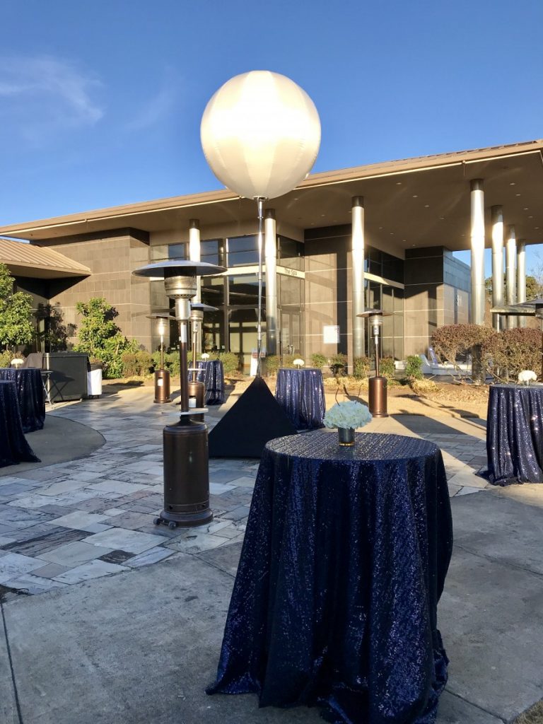 Navy Glitz Sequin Linens on a Cocktail Table with Airstar Lighting