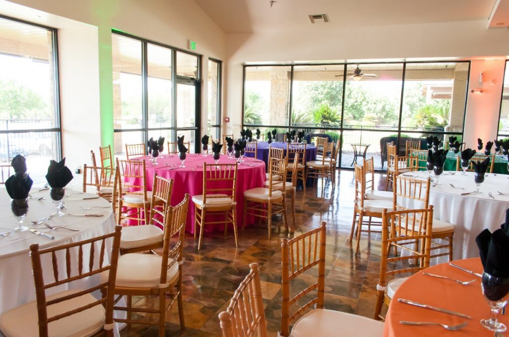 Assorted Color Polyester Linens with Gold Chiavari Chairs