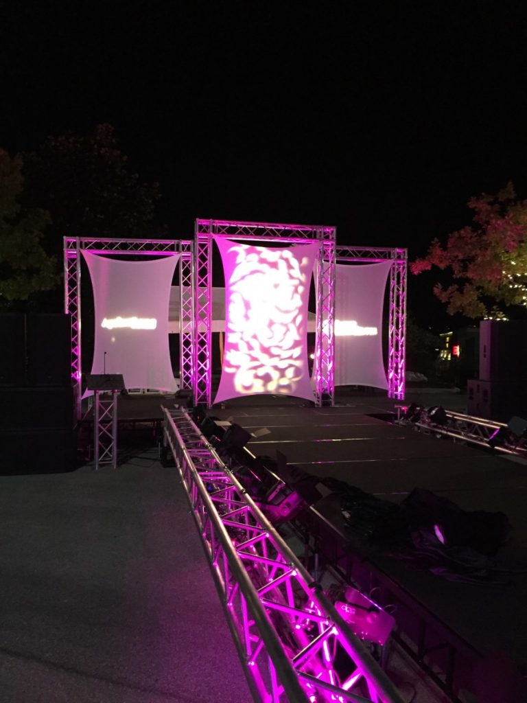 Fashion Show Staging with Lighted Spandex Backdrop
