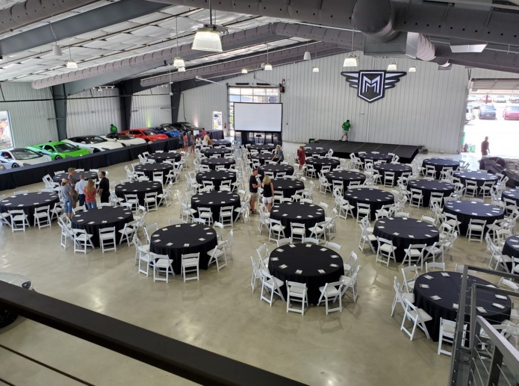 16&#039; x 24&#039; Stage - 16&quot; Height with Projection, Tables, Chairs, &amp; Linens