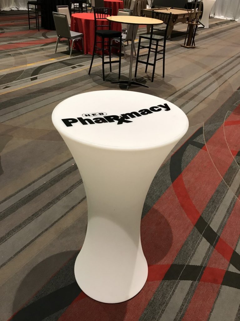 Custom Logo on Hourglass Cocktail Table